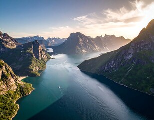 Panoramic view of a fjord system, mountains, and a tranquil body of water at sunset