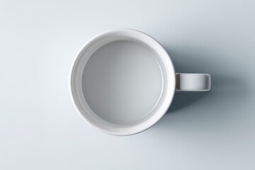 Minimalist White Mug - Top-Down View on Light Background.