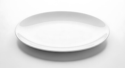 White ceramic plate on a white surface.