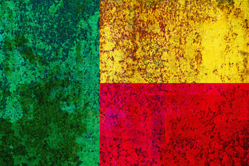 Distressed abstract of vertical green next to horizontal yellow and red fields evoke weathered...