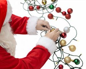 Santa Claus hands arranging colorful Christmas ornaments and lights on a transparent background. Isolated PNG image for holiday themes.