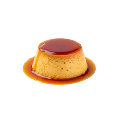 Golden custard dessert with a caramel topping served on a black background with its caramel sauce dripping around its base