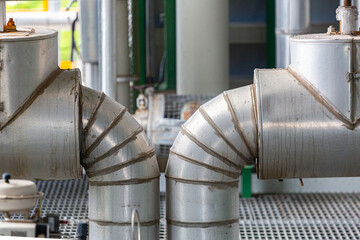 Chemical transfer pipes inside a production area of a chemical plant, insulated with thermal protection,