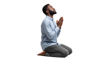 Devout young man with a beard kneeling in prayer.