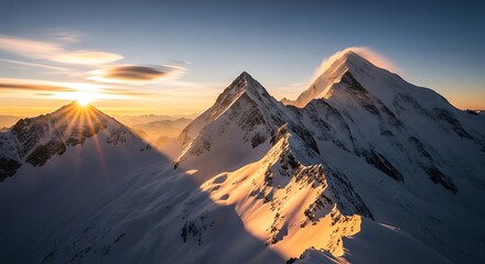 Majestic Mountain Peaks Bathed in Golden Sunrise Light.