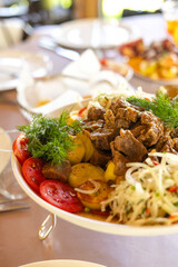 Meat with Potatoes: Home-Cooked Dish on Table
