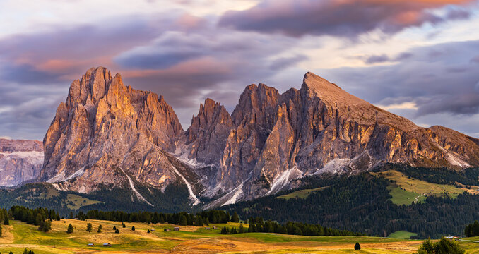 The UNESCO site Seiser Alm or Alpe di Siusi the Dolomite plateau and the largest high-elevation Alpine meadow in Europe located in Italy's South Tyrol province in the Dolomites in autumn sunset.