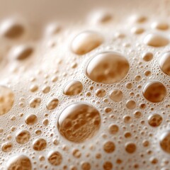 A close up of water droplets on a surface of water