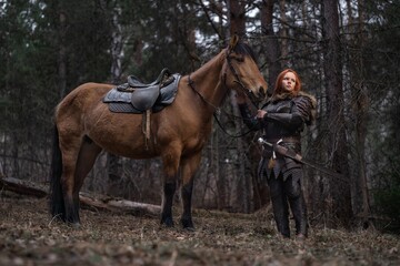 Warrior stands beside loyal steed amidst a dark, forested landscape.