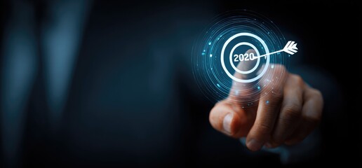 A hand touches a digital target, 2020 in focus