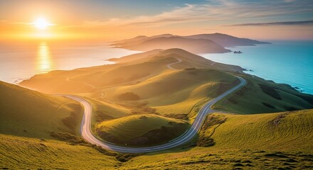 Scenic coastal road winding through green hills at sunset, with ocean views.