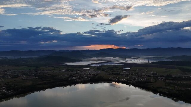 Golden Hour Panorama: Imbituba's Lakes, Fields, and Mountains