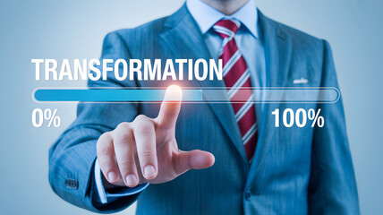 Business transformation progress, a businessman's touch propels success and growth, showing a visual representation of the completion bar at 100 percent