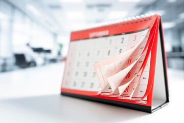 Calendar showing months and dates whilst turning the pages