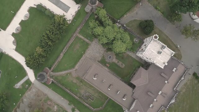 Aerial panning view Dadiani Palace Museum Zugdidi, 19th century neogothic residence with park, Samegrelo landmark &mdash; concepts: heritage, culture, history, tourism, architecture, education, museum