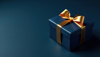 Obraz premium Dark blue gift box, gold ribbon, dark background Top view, holiday present , happy, luxury