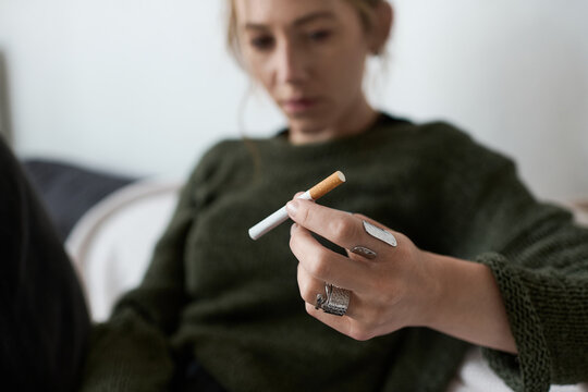 Young woman struggles with emotions in a quiet moment at home surrounded by silence