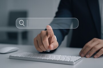 Person in business attire with hand poised to interact with the search bar, indicating online activity.