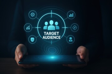 Digital marketing concept showcases a glowing, futuristic interface illustrating a target audience, supported by various icons, with a person holding a tablet, symbolizing digital targeting and...