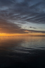 sunset over Lake Constance / Bodensee in Bregenz Vorarlberg Austria with clouds and intense colours and blue sky