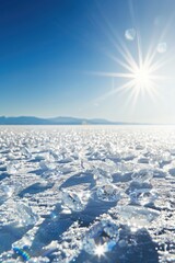 Expansive, sunlit icy landscape;  clear blue sky, broken ice covering a vast, frozen lake or sea.  Bright sunlight creates lens flares and shadows on the ice