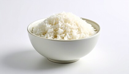 White ceramic bowl filled with fluffy cooked rice on plain white background&mdash;evoking purity, simplicity, and the quiet choreography of nourishment, tradition, and elemental care.