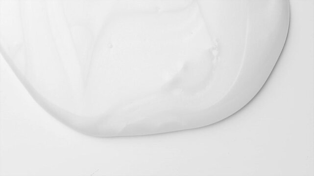 White shampoo gel flowing on white background, border design. Liquid gel dripping, shower fluid gel border, shampoo texture on white, body care cosmetic. Top view. 