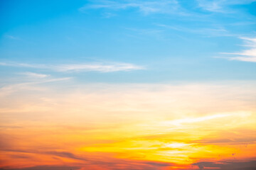 Beautiful , luxury soft gradient orange gold clouds and sunlight on the blue sky perfect for the background, take in evening,Twilight, Large size, high definition landscape photo