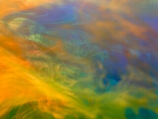A vibrant and dynamic abstract swirl of colorful hues creating a stunning visual experience, rich...