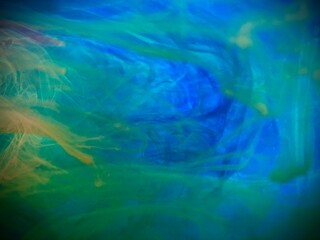 Captivating abstract watercolor art featuring an explosion of flowing, intertwining colors that evoke a sense of tranquility and artistic exploration.