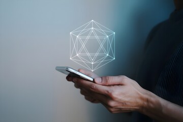 Hand holding smartphone with geometric shape futuristic technology concept augmented reality interface