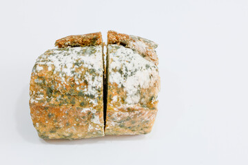 Close-up of Moldy bread on cutting board