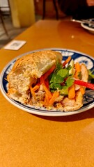 Vietnamese banh mi and fresh spring rolls at a local restaurant