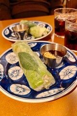 Vietnamese banh mi and fresh spring rolls at a local restaurant