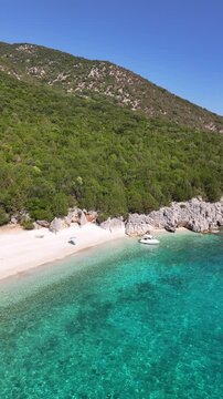 Stunning beaches, turquoise water and green islands in the Ionian Sea around Ithaka and Kefalonia, Greece