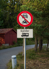 No entry sign for vehicles and motorcycles.