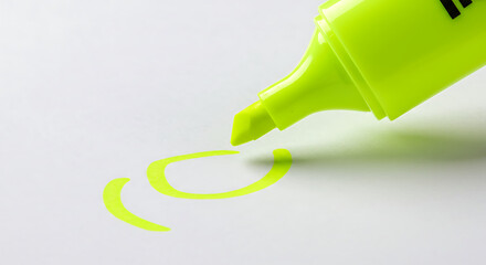 Close-up of a neon yellow highlighter with its cap off, leaving a partial circular mark on white paper.