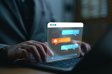 Businessman using AI chatbot on laptop with virtual chat interface. Futuristic artificial intelligence, virtual assistant, digital customer service, smart technology for automation and communication.