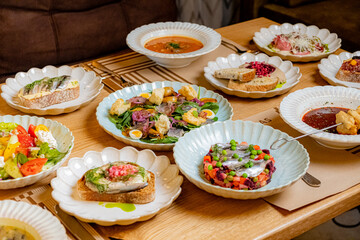 Vibrant dishes with fresh ingredients and unique flavors at a lively gathering