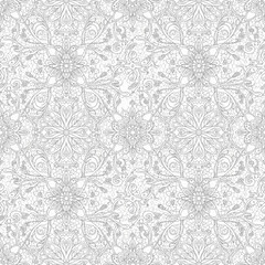 Elegant seamless ornamental pattern with intricate floral motifs in black and white. EPS Editable