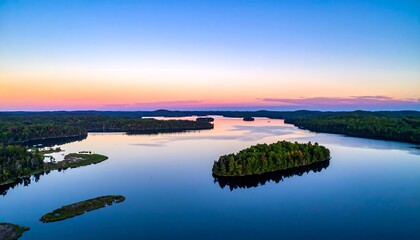 Obraz premium Serene lake vista at sunset