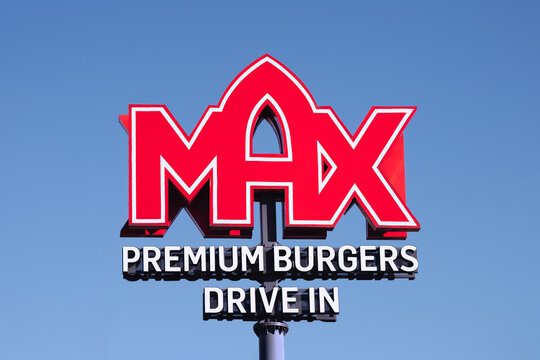 Poznan, Poland - September 24, 2025. Max Burgers logo sign on a blue sky background - Max Burgers is a fast food restaurants chain founded in Sweden.