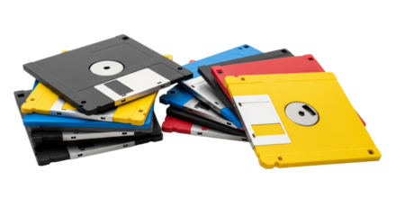 Collection of colorful floppy disks from the 1980s isolated on a white background showcasing technology of the past