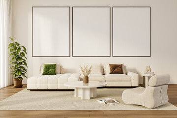 Triple Vertical Poster Frames Above Modern Sofa in Spacious Living Room with Green and Brown Pillows