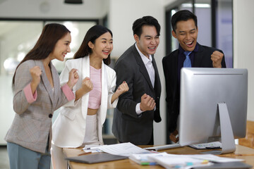 Business meeting, group of successful businessmen having fun and congratulating their colleagues in the office. Successful teamwork with coworkers.