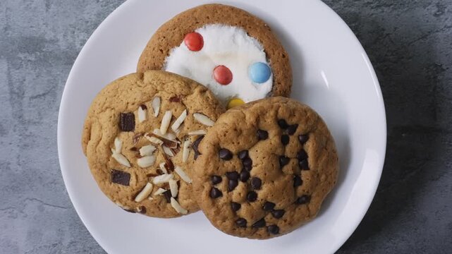Cookie on Rotating Plate, Showing Detailed Crumbly Texture, Golden Brown Surface, and Sweet Delicious Appearance of Gourmet Dessert