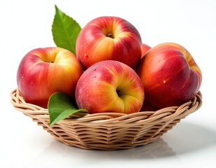 Fresh Nectarines in Wicker Basket with Green Leaves on White Background