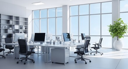 Modern office interior with desks, chairs, computers, and large windows with natural light, creating a bright and productive workspace