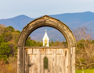 Wooden archway framing a church steeple