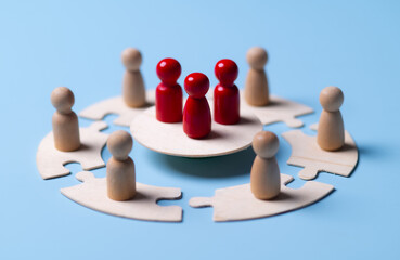 Red Leader Pawn Surrounded by Team on Puzzle Piece Ring: Unity and Leadership Concept